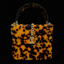 Load image into Gallery viewer, A MARBLED LUCITE MINI ATTACHÉ WITH GOLD FITTINGS