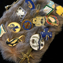 Load image into Gallery viewer, A KANGAROO SKIN PURSE WITH 28 VINTAGE GIRL GUIDE PINS.