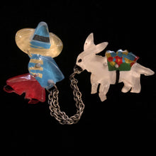 Load image into Gallery viewer, A 1940s VINTAGE LUCITE MEXICAN AND MULE BROOCH
