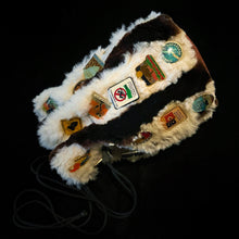 Load image into Gallery viewer, A 1980s KANGAROO SKIN POUCH DECORATED WITH TOURIST BADGES FROM THE N.T.