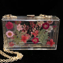Load image into Gallery viewer, A PERSPEX CLUTCH WITH ENCASED WILD FLOWERS