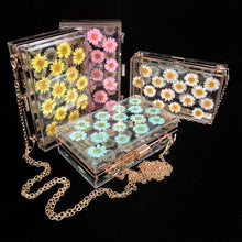Load image into Gallery viewer, A PERSPEX CLUTCH WITH REAL DAISIES