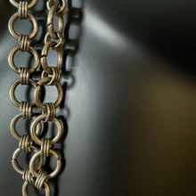 Load image into Gallery viewer, A SUBSTANTIAL 1970s HORSESHOE NAIL PENDANT