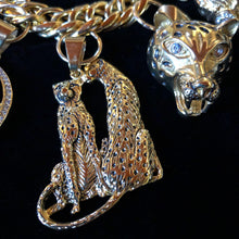 Load image into Gallery viewer, A SUBSTANTIAL GILT CAT THEMED CHARM BRACELET