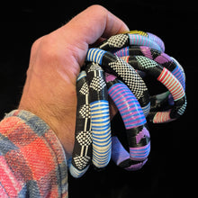Load image into Gallery viewer, A COLLECTION OF NINE BURKINA FASO AFRICAN BANGLES