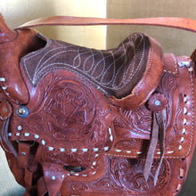 Load image into Gallery viewer, A VINTAGE TOOLED LEATHER SADDLE BAG FROM MEXICO