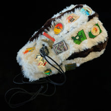 Load image into Gallery viewer, A 1980s KANGAROO SKIN POUCH DECORATED WITH TOURIST BADGES FROM THE N.T.