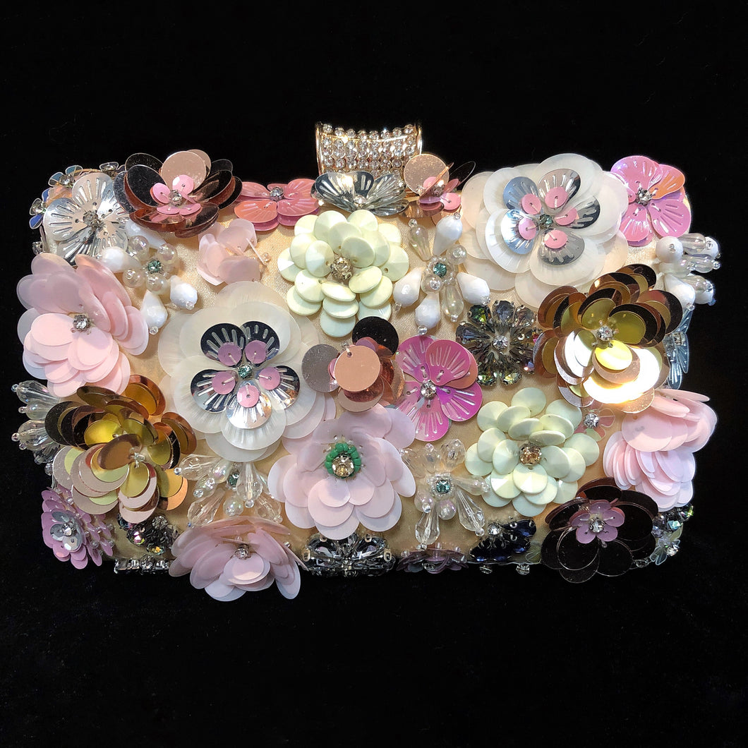 A PINK FLOWER ENCRUSTED EVENING PURSE