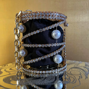 A RHINESTONE CAGE BAG WITH GIANT PEARLS