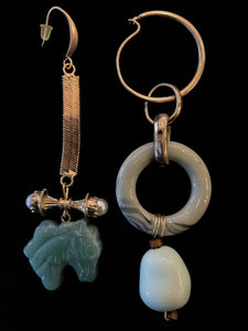 A PAIR OF MISMATCHED SCULPTURAL EARRINGS