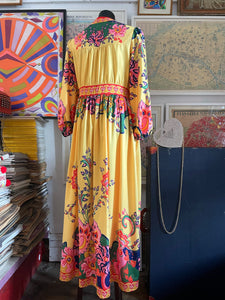 A YELLOW AND PINK FLORAL-ORNAMENT PRINT MAXI DRESS.
