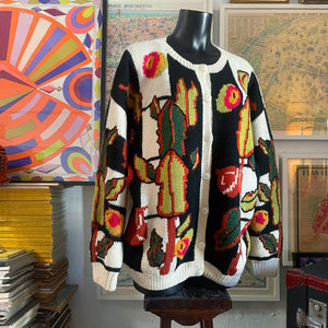 A 1980s GUMNUTS AND LEAVES KNIT CARDIGAN BY JENNY KEE