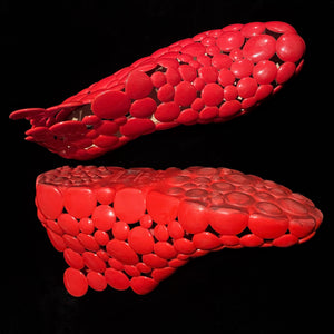 A PAIR OF GAETANO PESCE FOR MELISSA RED RUBBER SHOES