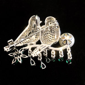 TWO BIRDS ON A BRANCH BROOCH WITH SINGLE PEARL