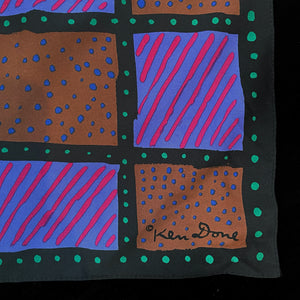 A 1980s GEOMTERIC SQUARES PRINT SCARF BY KEN DONE