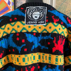 A 1980s JENNY KEE CARDIGAN WITH DOLPHINS AND WARATAH
