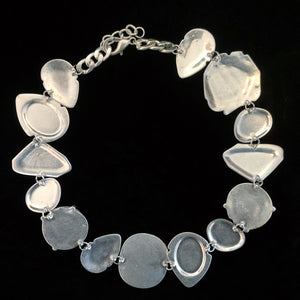 A TEXMEX STYLE SILVER-TONE NECKLACE