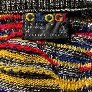 AN ORIGINAL 1980s COOGI KNIT CARDIGAN IN PRIMARY COLOURS