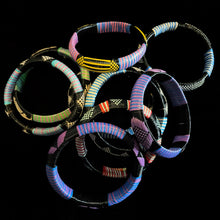 Load image into Gallery viewer, A COLLECTION OF NINE BURKINA FASO AFRICAN BANGLES
