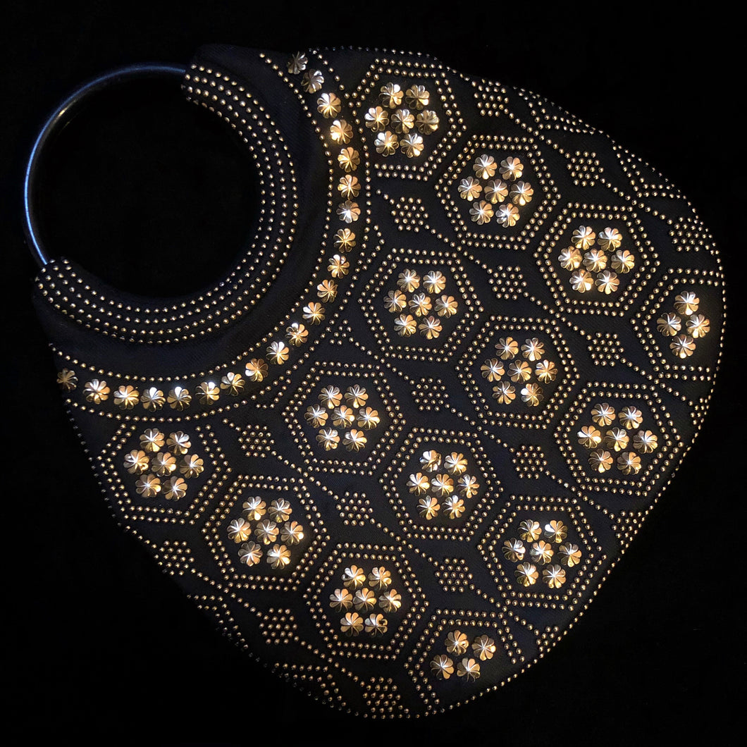 A CUTE 1970s BLACK SHOPPER WITH GOLD BEDAZZLING