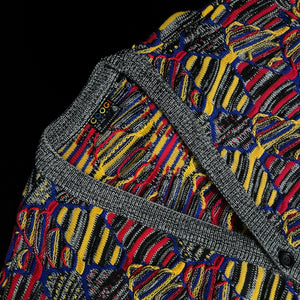 AN ORIGINAL 1980s COOGI KNIT CARDIGAN IN PRIMARY COLOURS