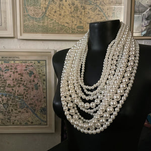 A SUBSTANTIAL MULTI-STRAND PEARL NECKLACE