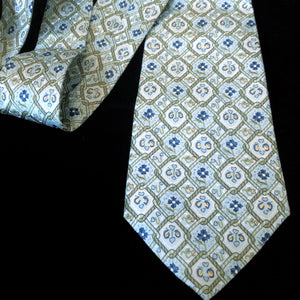 A VINTAGE 1990s HERMES TIE WITH CHAIN PRINT